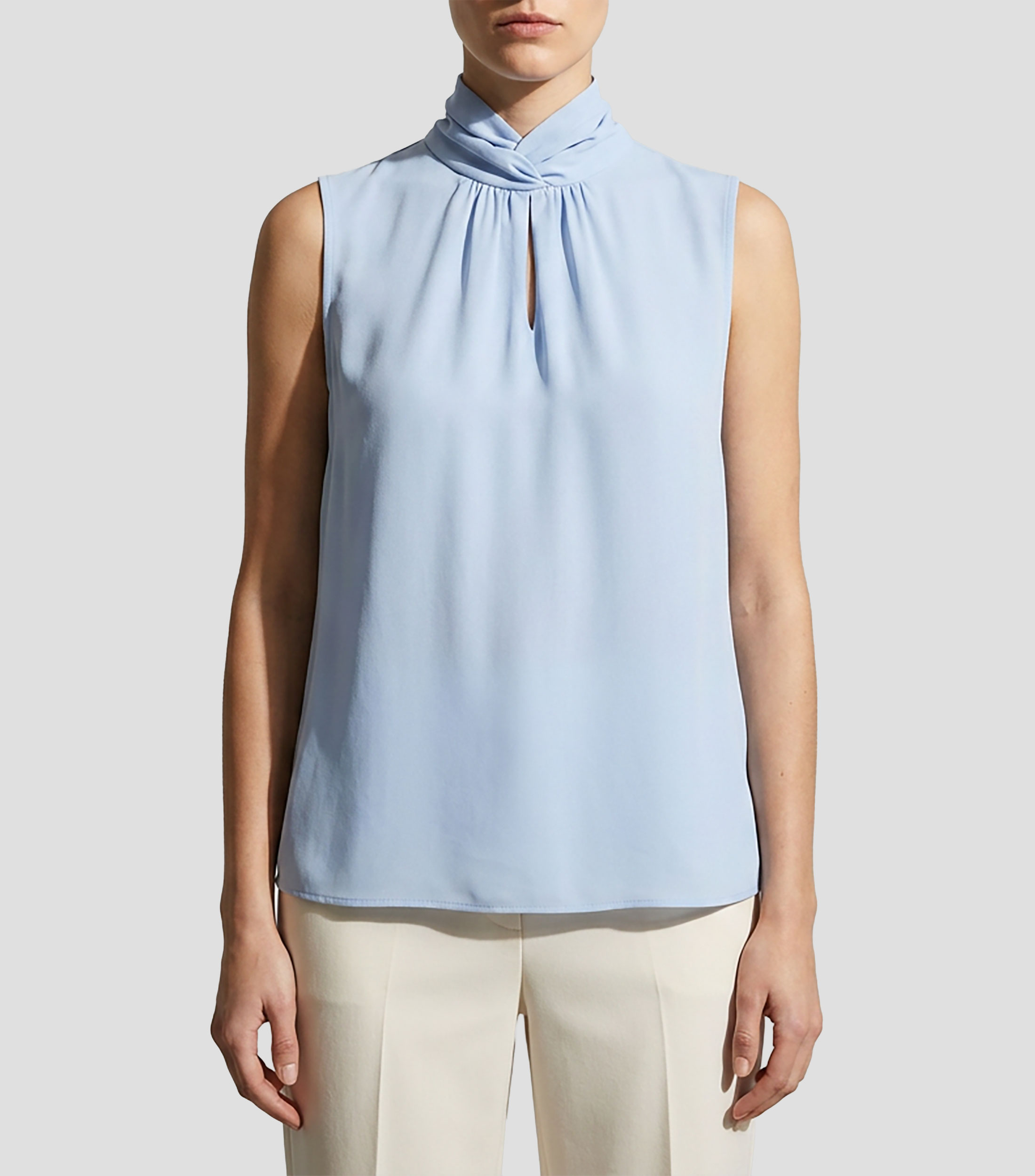 Blusa lisa sin mangas Mujer